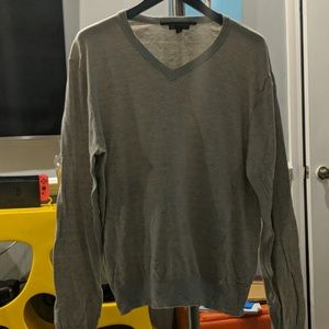 Gray an orange stripped Gap sweater